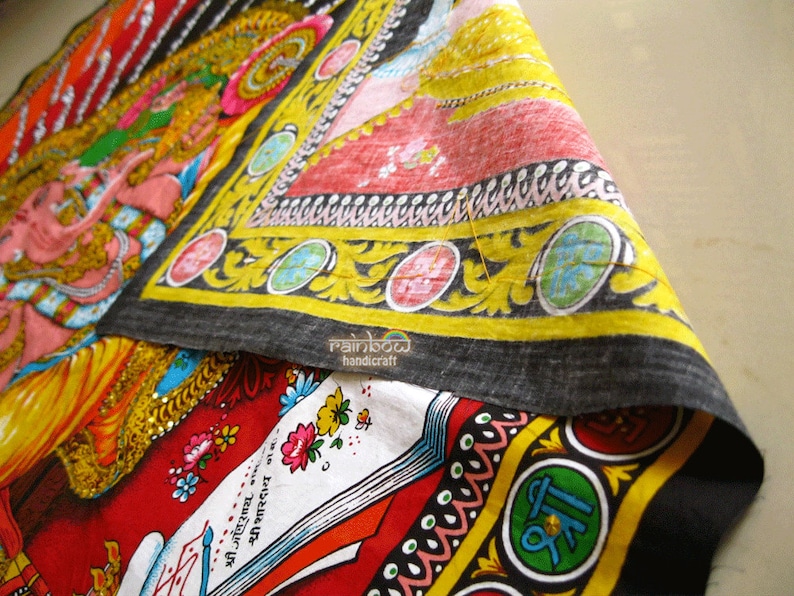 cotton fabric with detail of backside with sequin treads shows.