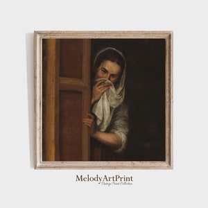 May include: A vintage oil painting of a woman peeking from behind a wooden door. She is wearing a white headscarf and a dark dress. The painting is framed in a light wood frame.