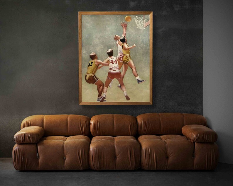 May include: A vintage illustration of four basketball players in action. The players are wearing jerseys with numbers 25, 44, and 51. The illustration is framed in a brown wooden frame.