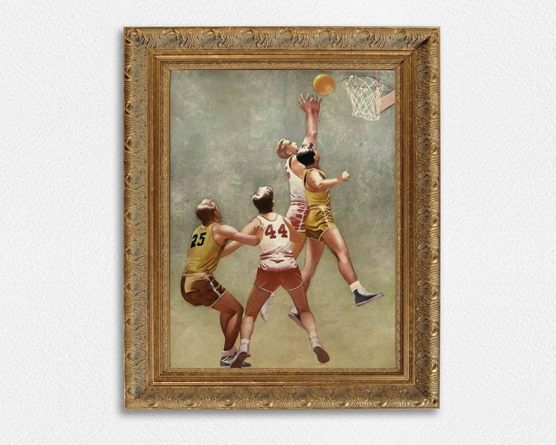 May include: A vintage framed painting depicting four basketball players in action. The players are wearing yellow and red jerseys with numbers. The player in the center is jumping to shoot the ball into the hoop. The background is a muted green.