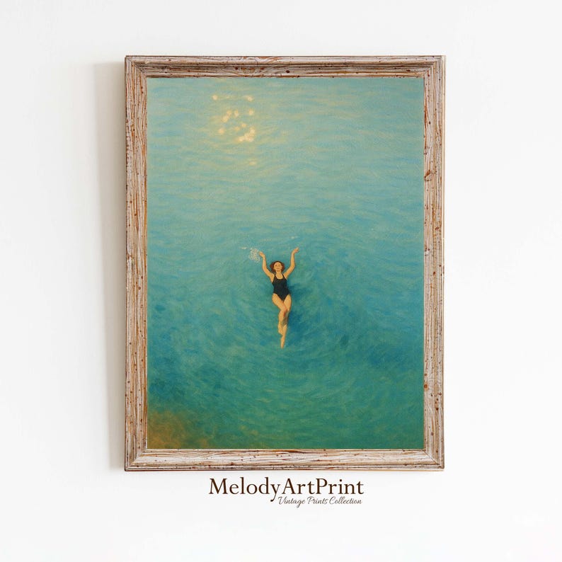 May include: A framed print of a person swimming in turquoise water. The person is wearing a black swimsuit and has their arms raised. The water has a sunlit area. The frame is a light brown color. The text "MelodyArtPrint Vintage Prints Collection" is at the bottom.