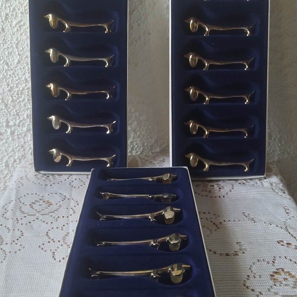 Lot de 18 portes couteaux métal argenté