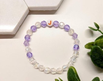 Pulsera inicial con cuentas elásticas de bricolaje