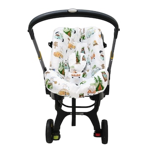 Handgefertigte Doona+ Sitzauflage mit verspieltem Print für den Autositz und Kinderwagen