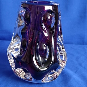 May include: A rustic wooden sign with the text "Welcome to our home" in white lettering. The sign features a distressed finish and a simple, inviting design, perfect for front door decor.