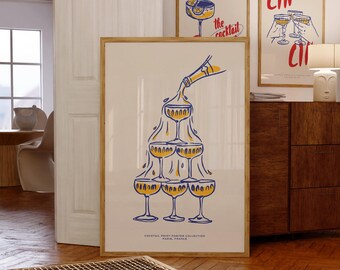 Puede incluir: Un póster blanco con una ilustración azul y amarilla de una botella de champán que se vierte en una pirámide de copas de champán. El texto "Cocktail Print Poster Collection Paris, France" está en la parte inferior del póster.