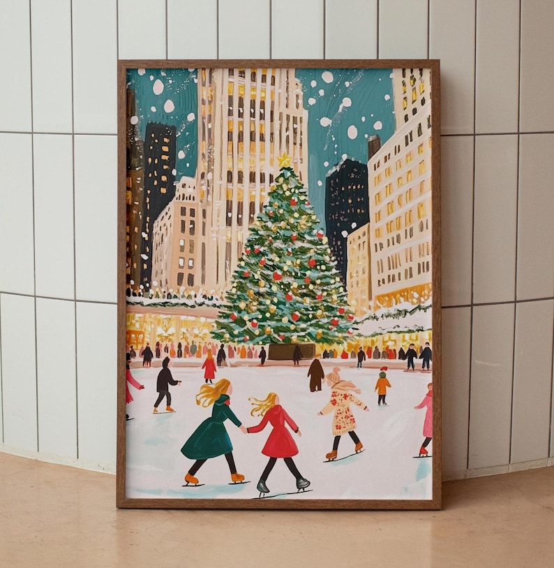 May include: A painting of a snowy city scene with a large Christmas tree in the center. People are ice skating on a rink in front of the tree. The buildings are tall and have many windows. The sky is blue and there are snowflakes falling.
