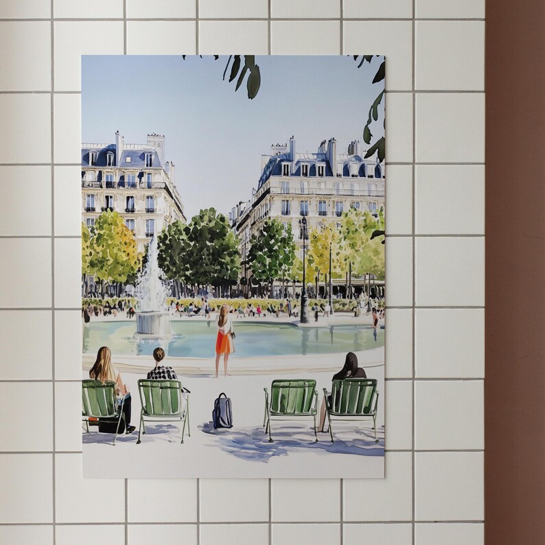 May include: A watercolor painting of a Parisian square with a fountain in the center. People are sitting on benches and walking around the square. There are buildings in the background and trees lining the square.