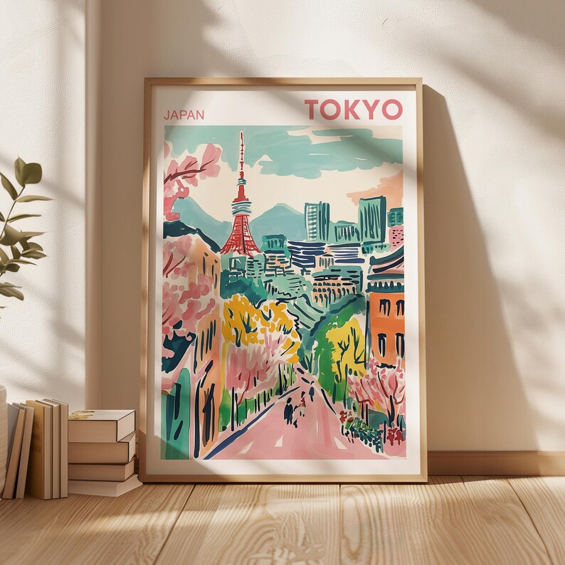 May include: A colorful illustration of Tokyo, Japan, with a tall tower in the center and a street lined with trees. The text "TOKYO" is at the top of the image and "JAPAN" is at the top left.