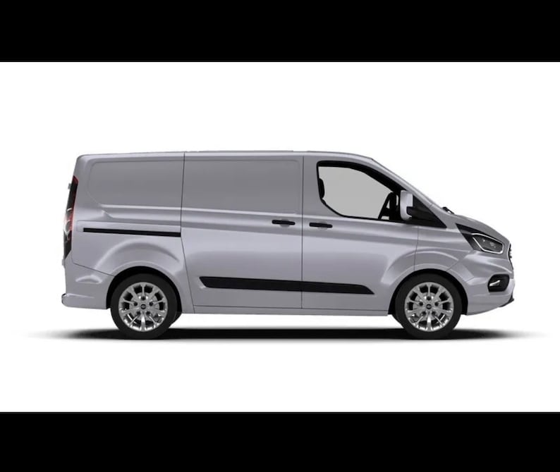 May include: A silver Ford Transit van with sliding doors and a black trim around the windows. The van is parked on a white background.