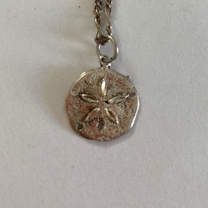 Silver Sand Dollar Pendant Necklace on 18-Inch Chain