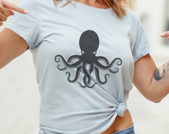 May include: A light blue t-shirt with a black silhouette of an octopus printed on the front.