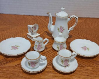 Vintage 12 piece miniature porcelain decorative children&#39;s tea set for 2 with matching phonograph, rose motif and gold accents