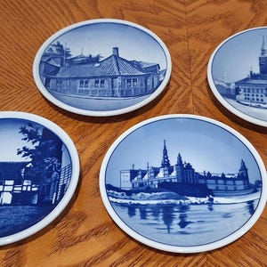 Set of 4 Vintage Royal Copenhagen Denmark 3.25in souvenir porcelain plates, collectable wall decor