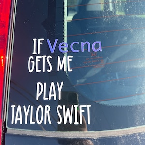 May include: A white sticker on the back window of a car that reads "If Vecna gets me play Taylor Swift".