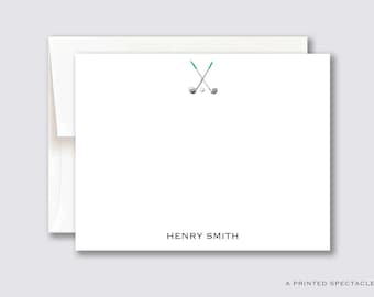 May include: White stationery card with a green and silver golf club design and the name "HENRY SMITH" printed at the bottom.