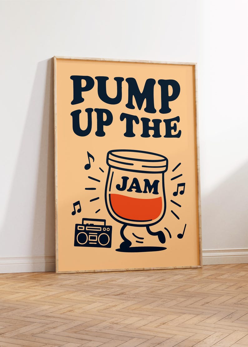 May include: A framed poster with the words "PUMP UP THE JAM" in navy blue. A cartoon jar of jam with legs dances next to a boombox, surrounded by musical notes. The background is a light orange color.