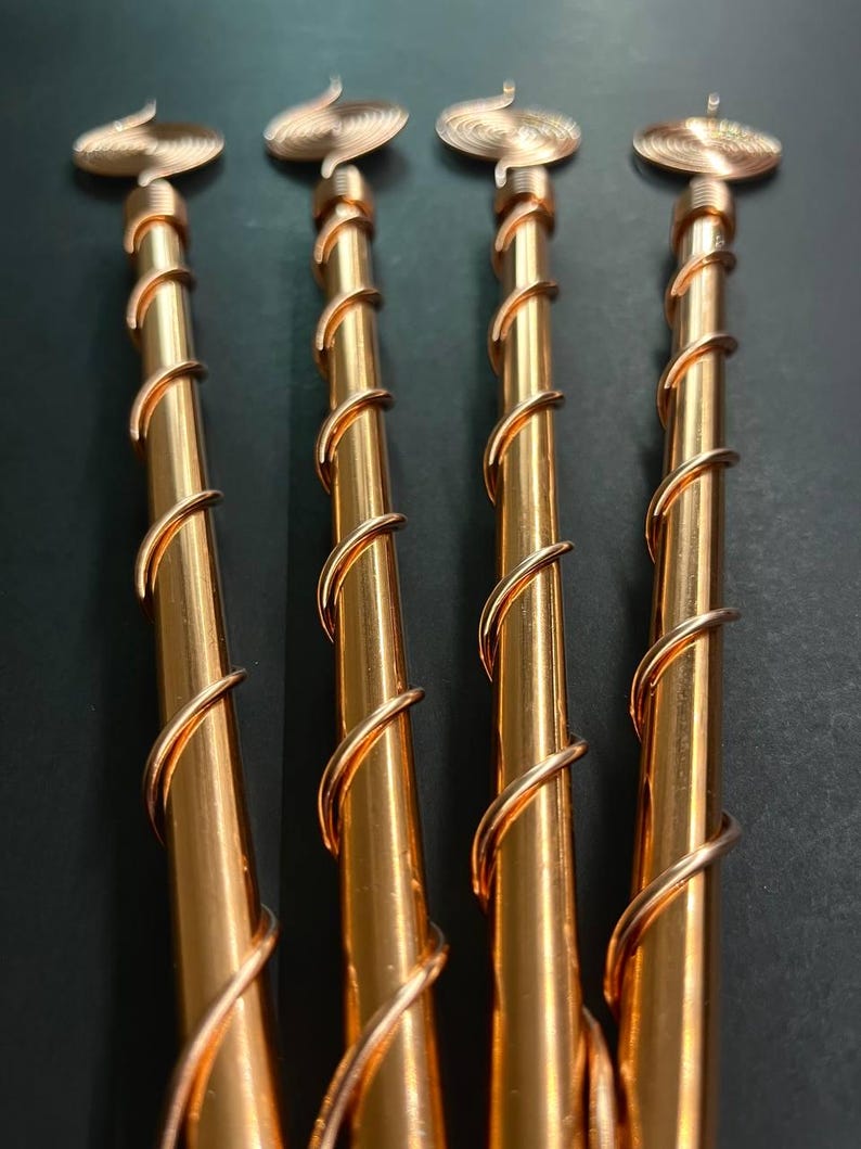 Close-up of twisted copper spirals demonstrating energy flow pattern