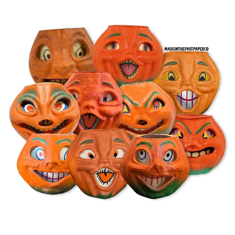 May include: A collection of ten orange paper mache Halloween jack-o'-lantern decorations with various facial expressions.  The jack-o'-lanterns are all different sizes and shapes, and some have painted details.  MADEINTHEPASTPAPERCO is printed on one of the jack-o'-lanterns.