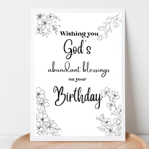 May include: Black and white printable card with floral borders. The text reads "Wishing you God's abundant blessings on your Birthday."