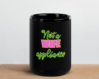 May include: A set of three ceramic mugs with a speckled, matte finish. The mugs are in shades of cream, light gray, and dark gray. Each mug has a simple, minimalist design, perfect for coffee or tea.