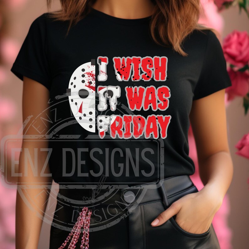 K&ouml;nnte beinhalten: Schwarzes T-Shirt mit einer wei&szlig;en Grafik einer Hockeymaske und dem Text "I wish it was Friday".