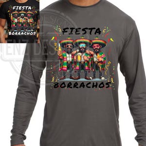 May include: Dark gray long-sleeve shirt featuring a colorful illustration of three men in sombreros, holding drinks. The text "Fiesta" and "Borrachos" are above and below the illustration. The shirt has a crew neck.
