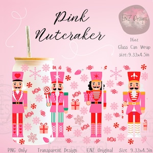 May include: A pink glass can wrap with a festive design featuring pink nutcracker illustrations, snowflakes, and candies. The text "Pink Nutcracker" is displayed at the top. The wrap is 9.33 x 4.5 inches.