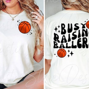 Busy Raising Ballers PNG, busy raising ballers png, basketball mama svg, basketball svg, trendy basketball, trendy basketball mom, mom shirt