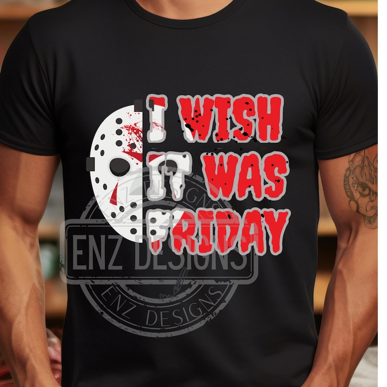K&ouml;nnte beinhalten: Schwarzes T-Shirt mit einer wei&szlig;en und roten Grafik einer Hockeymaske und dem Text "I wish it was Friday".