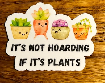 May include: A white sticker with the text "IT'S NOT HOARDING IF IT'S PLANTS." The sticker features four cartoon succulents in pots with smiling faces. The plants have green, pink, and purple leaves.