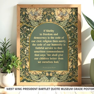 May include: A framed museum-grade poster featuring a quote from President Bartlett of The West Wing. The quote is set against a green background within a gold-edged arch, surrounded by a floral pattern in green, gold, and cream. The frame is light brown.
