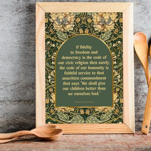 May include: Wooden framed print with a green and gold floral pattern background. The print features a quote in a green arch shape with gold trim. Wooden spoons and a spatula are next to the framed print.