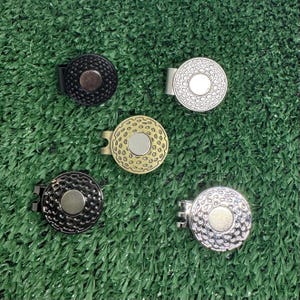 Magnetic hat clip for golf ball markers