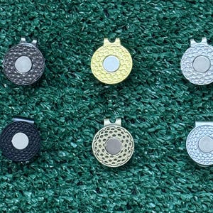 Magnetic hat clip for golf ball markers