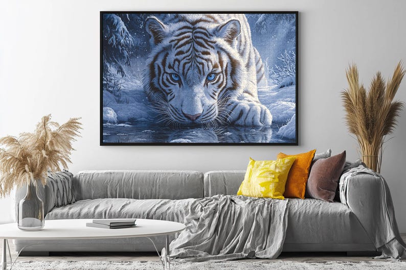 May include: A white tiger with blue eyes stares intensely at the viewer from a snowy forest setting. The tiger is lying in a pool of water, with its reflection visible in the water.