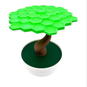 May include: A decorative tree sculpture with a bright green, hexagonal canopy and a brown, curved trunk. The tree sits in a white pot with a dark green interior, creating a modern, minimalist aesthetic.