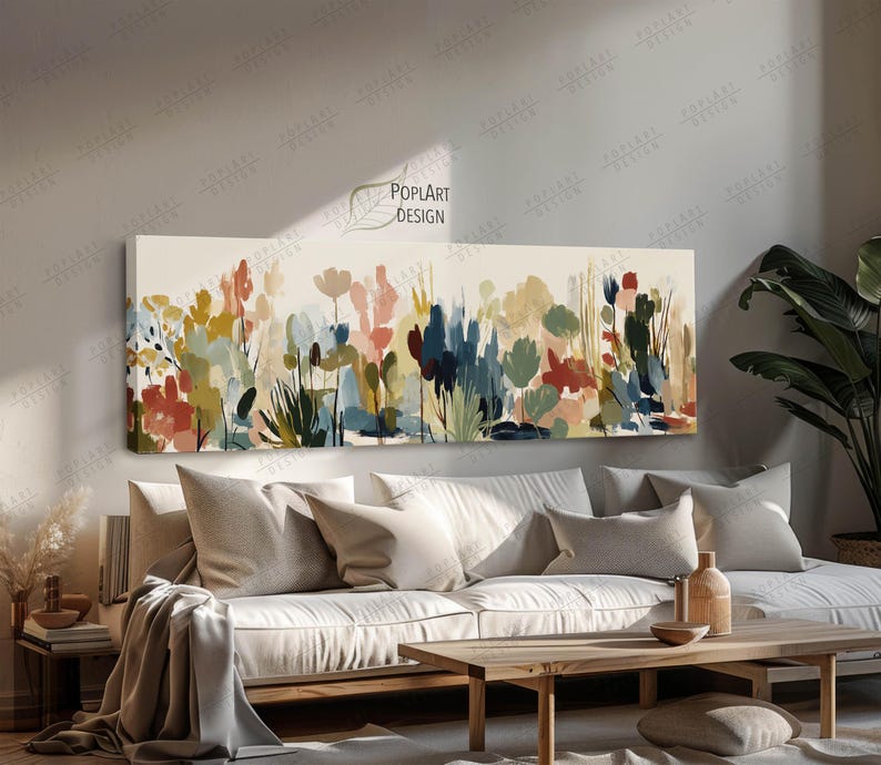 May include: A long rectangular canvas art piece featuring an abstract floral design. The artwork showcases a variety of colorful brushstrokes in shades of red, blue, green, and yellow, creating a vibrant and textured landscape.