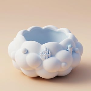 Könnte beinhalten: Eine weiße, wolkenförmige Dekoschale mit hellblauem Innenraum. Die Schale hat ein kleines Schloss und einen Turm auf der Außenseite. Die Schale besteht aus einem glatten, matten Material und steht vor einem weichen, neutralen Hintergrund.