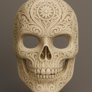 May include: A detailed, cream-colored skull mask with intricate floral and swirl carvings. The mask features open eye sockets and a smiling mouth, with a floral design on the forehead. The overall design is symmetrical and ornate.