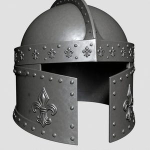 May include: A grey metal medieval helmet with a rounded crown and a face guard. The helmet is decorated with fleur-de-lis emblems and rivets. The face guard is open, showing the inside.