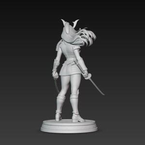 May include: A gray 3D-printed figurine of a female warrior, viewed from the back. She wears armor, a helmet, and a short skirt, holding a sword and a chain weapon. The figure stands on a circular base against a dark background.