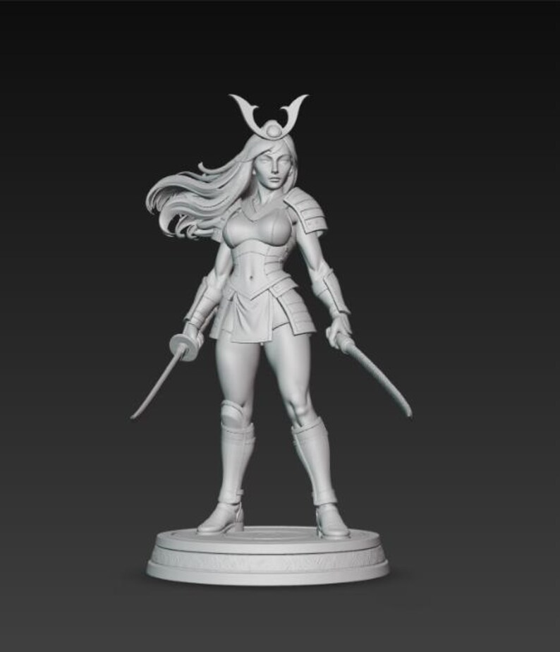 May include: A detailed, monochromatic sculpture of a female warrior in a dynamic pose. She is clad in stylized armor, holding two swords. Her long hair flows, and she wears a horned helmet. The figure stands on a circular base, showcasing intricate details.