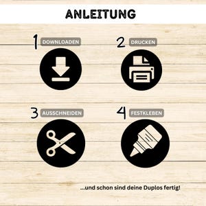 May include: A four-step instruction guide with icons for downloading, printing, cutting, and gluing. The text in the image reads "ANLEITUNG", "DOWNLOADEN", "DRUCKEN", "AUSSCHNEIDEN", "FESTKLEBEN", and "...und schon sind deine Duplos fertig!"