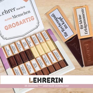 Könnte beinhalten: Eine Schachtel Merci-Schokolade mit verschiedenen deutschen Sätzen auf den Verpackungen, darunter "für Rechenspaß im Kopf" und "für kleine Erfolgsmomente". Die Schachtel ist geöffnet und zeigt mehrere Schokoriegel. Eine Karte mit deutschem Text ist sichtbar.