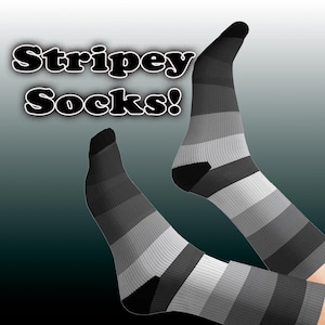 May include: A pair of striped socks in shades of gray. The socks are folded up and the stripes are horizontal. The socks are made of a soft, comfortable material.