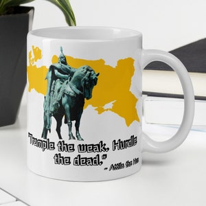 May include: White ceramic mug with a yellow map of Europe and a statue of Attila the Hun on horseback. The mug has the quote "Trample the weak.  Hurdle the dead." - Attila the Hun.