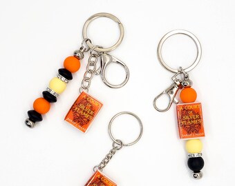 Mini Book Keychain – A Court of Silver Flames – Nesta & Cassian Fantasy Romance Merch for Fantasy Romance Readers | BookTok Book Lover Gift