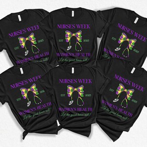 May include: Six black t-shirts with the text "Nurses Week" and "Women's Health" in white. Each shirt features a purple and green bow with a stethoscope in the center. The text "EST 2025" is printed on each shirt.