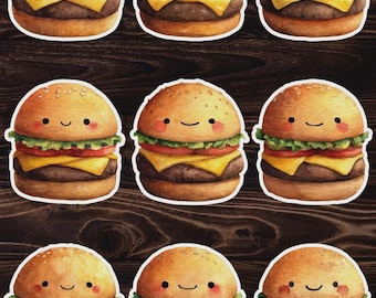 May include: Nine watercolor-style stickers of smiling hamburgers. Each burger has a sesame seed bun, a beef patty, cheese, tomato, and lettuce. The burgers have cute, smiling faces.